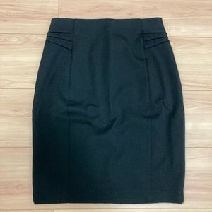 Black Express Pencil Skirt. High waisted, knee length, back slit. Size 0